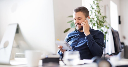 Businessman discussing financial documentation related to a Standby letter of credit.