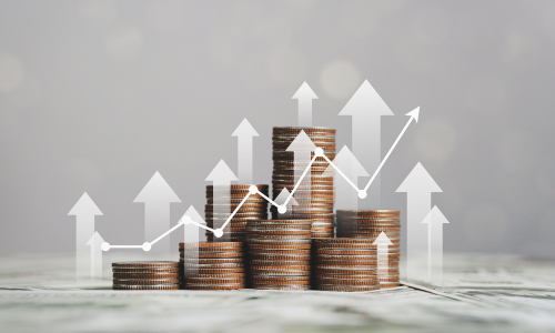 Stacks of coins with rising arrows and a financial growth chart overlay, symbolizing increasing profits and trade, related to TradePay